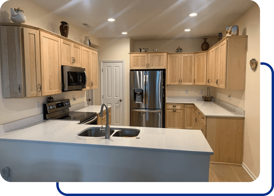 Modern kitchen with wooden cabinets and appliances.