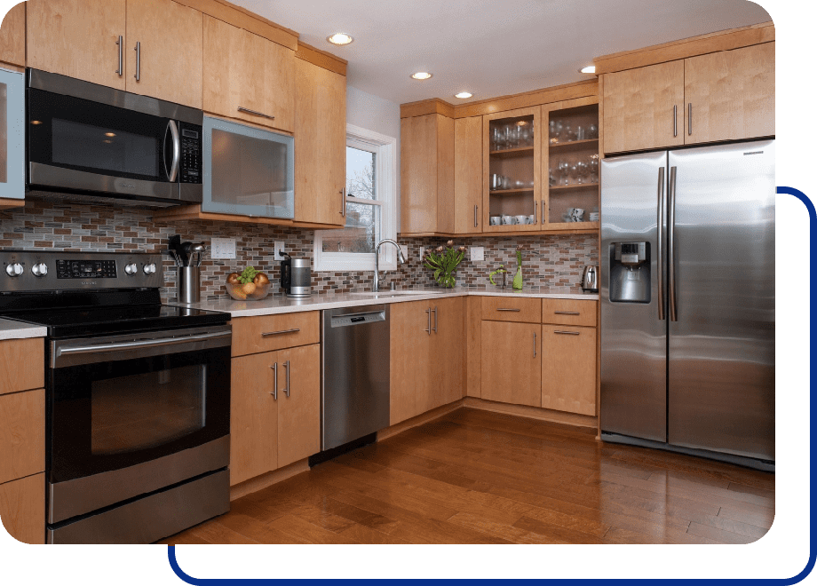 Modern kitchen with wooden cabinets and appliances.